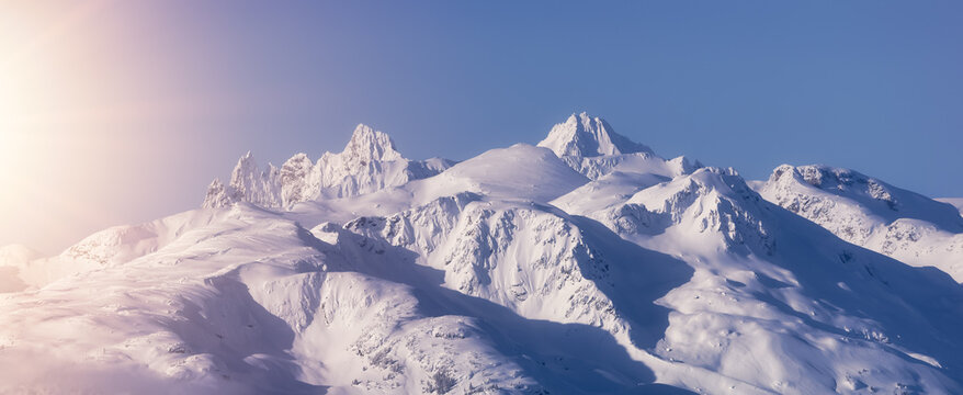 Snow and Cloud covered Canadian Nature Landscape Background. Winter Season in Whistler, British Columbia, Canada. From Blackcomb Mountain. Sunset Sky Art Render