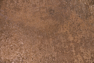 The texture of the surface of an uneven stone. Background design or template for your product. Decorative rough stylized textured background with space to copy. High quality photo