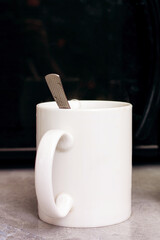 Two mugs on the kitchen table closeup