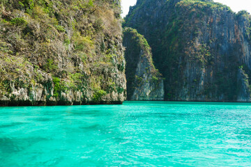 Naklejka na ściany i meble Sea lagoon and green rock in Thailand. Traveling and vacation concept.