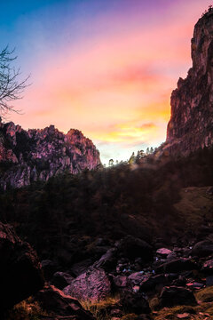 sunset in canyon with big cliffs in front, forest in basaseachi chihuahua 
