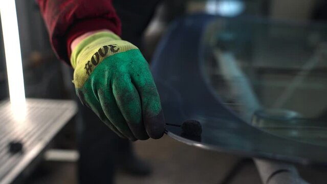 Primer Application New Car Windshield .Slow Motion.