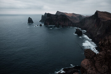 Fototapeta na wymiar São Lourenço , a drone view of the landscape and a cliff rising above the ocean, where you can see the folds,