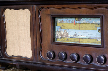 Vintage radio front with buttons and dial