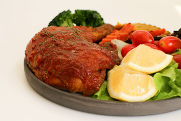 Close up Roasted Chicken with Grilled vegetable for side dish