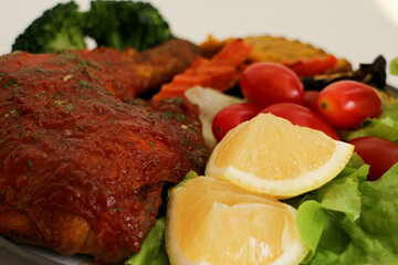 Close up Roasted Chicken with Grilled vegetable for side dish