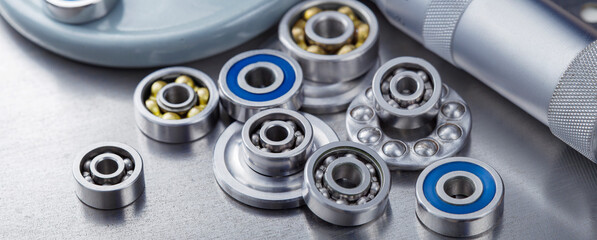 different bearings on a metal background. Part of mechanism.