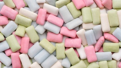 Colourful chewing gum top view. Heap of Multi colored chewing gum