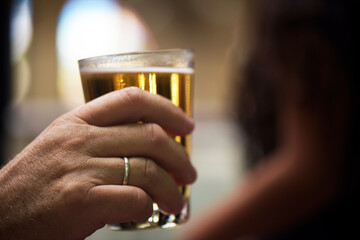 Man making toast with beer