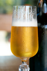 Casual photo of sweaty glass of beer