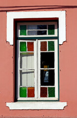 Fototapeta na wymiar Ancient house window of the historic city
