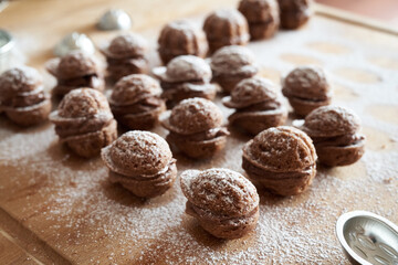 Preparation of Christmas cookies in the form of nuts