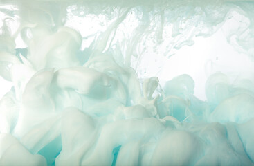 Light blue background. Texture in blue pastel colors. Ink in water.