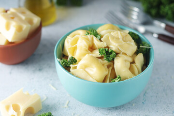 A bowl with Italian dumplings - tortellini