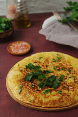 Frittata, traditional egg and potato omelette, Italian dish