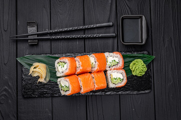 Classic Philadelphia sushi roll set with salmon and cream cheese.