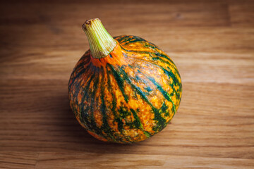 pumpkin on a wooden table