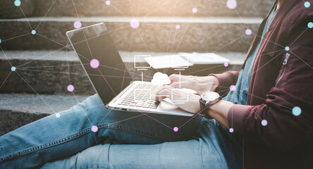 Man using laptop with data information on the Cloud Computing Technology Internet Storage Network Concept And a large database big data Through internet technology, Cloud sharing download and upload