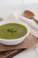 Close up of Bowl of green spincah soup