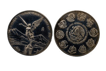 Anverso y reverso de la moneda troy de plata de 2003 con el ángel de la independencia y en el reverso los diferentes escudos del águila devorando una serpiente.