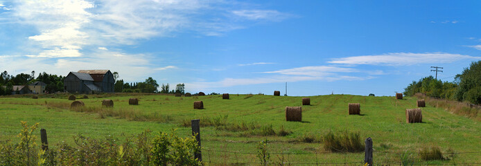 Sprawling farm land and farm houses is Manitoulin, ON, Canada