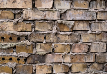 Stone wall background. Textured pattern facade building. macro soft focus