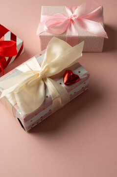 Valentine's day gift boxes with satin bow, vertical image, Mother's Day