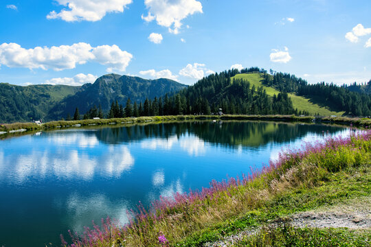 Mountain lake on the Grafenberg hill in the Austrian Alps above the town of Wagrain.