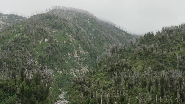 river running through the volcanic landscape of Chaiten