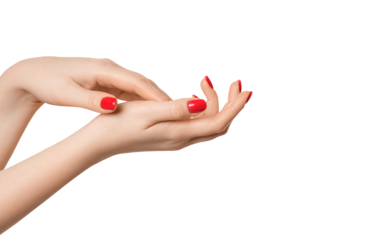 Beautiful, well-groomed female hands with a manicure on a white background, isolate. Red nail polish.