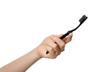 Woman's hand with a toothbrush. Isolate on a white background.