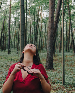 Woman In Pine Forest, Enjoying Herself