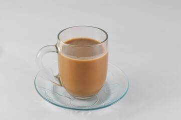glass of cappuccino with a saucer