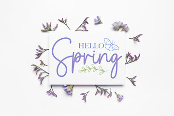Card with text HELLO, SPRING and flowers on white background