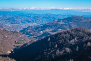 Obraz premium Winter panorama of the hills of Langhe (Piedmont, Northern Italy); this area is world famous for valuable red and sparkling wines production and hazelnuts cultivation.