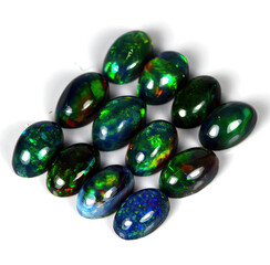 Natural gemstone rainbow opal on gray background