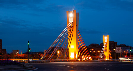 Fototapeta na wymiar Night illumination bridge of Can Peixauet. Santa Coloma. Spain