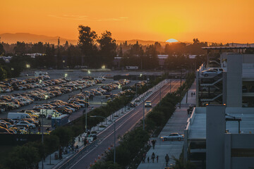 Sunset, city, cars.