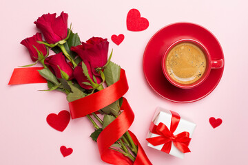 Fototapeta na wymiar Gifts and coffee for valentines day on color background, top view