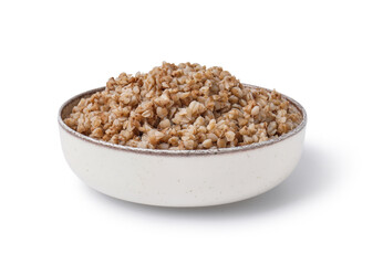 Bowl of tasty buckwheat porridge isolated on white background