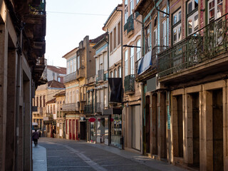Fototapeta na wymiar Picturesque view of old houses and streets of Vila Real town at sunny spring morning, Portugal