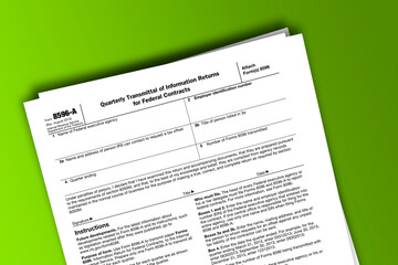 Form 8596-A documentation published IRS USA 08.22.2013. American tax document on colored