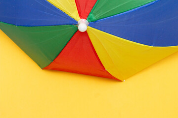 carnival parasol on the yellow background