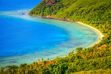 Tropical sandy beach at summer day in Fiji Islands, Pacific ocean