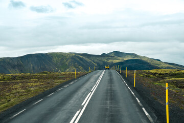 Empty road or highway in the natural environment of Iceland on a cloudy day