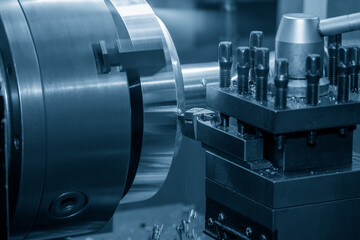 Closeup scene the lathe machine finish cut the metal parts.