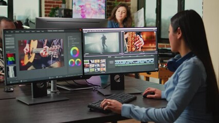 Videography expert editing video footage in post production agency house, improving montage quality on creative software. Video editor working on movie or film lighting, filmmaking industry. - Powered by Adobe