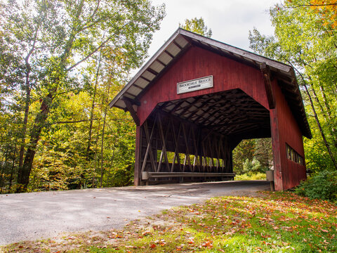 Brookdale Bridge is a covered bridge in red painted wood in Stowe, Vermont.