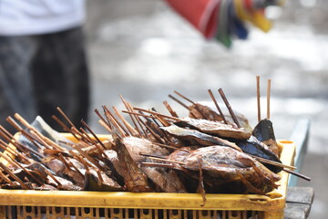 Smoked fish, the process of processing fish by smoking, smoked fish can be found in fishing village...