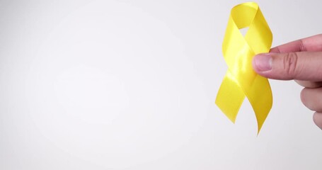 Suicide prevention day, Childhood, Sarcoma, bone, and bladder cancer Awareness month and Yellow Ribbon for supporting people's life and illness. children's Healthcare and World cancer day concept